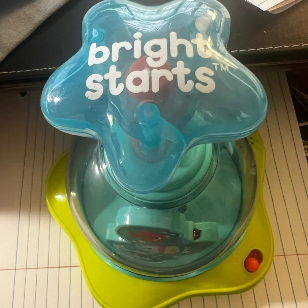 BRIGHT STARS PRESS AND GLOW SPINNER.  EVERY PUSH MAKES THE STARS GLOW